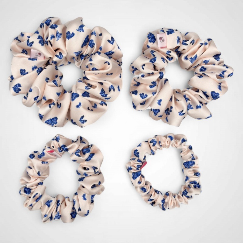 SET MIT VIER SCRUNCHIES MIT SCHMETTERLINGSMOTIV
